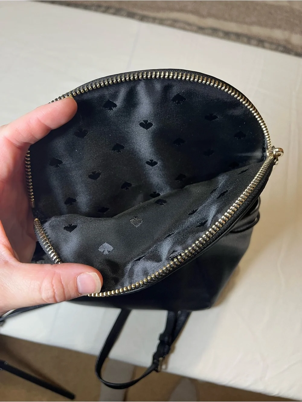 kate spade Black Leather Drawstring Flap Backpack